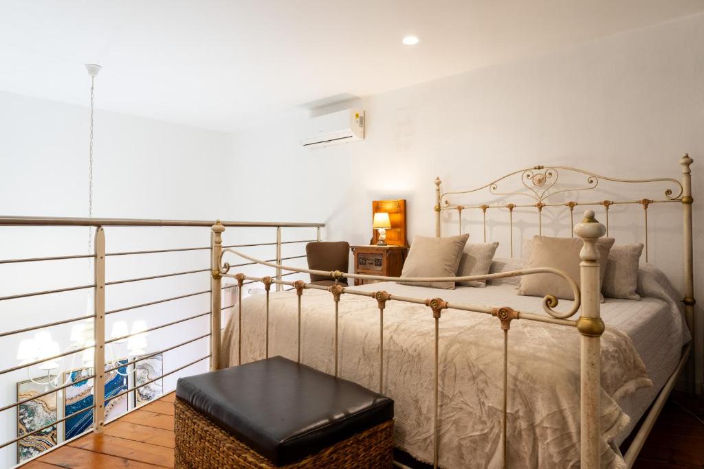 Posteľ alebo postele v izbe v ubytovaní Ortigia Sweet Home
