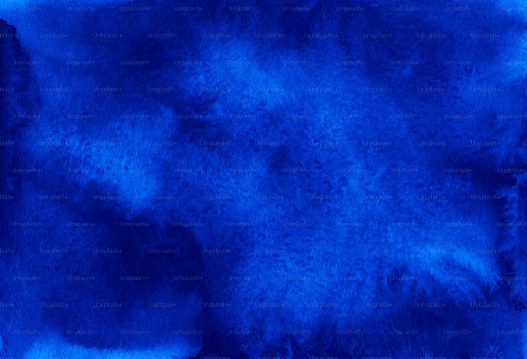 een blauwe achtergrond met rook die eruit komt bij Orchidée SPA King size Room in Breitenbach