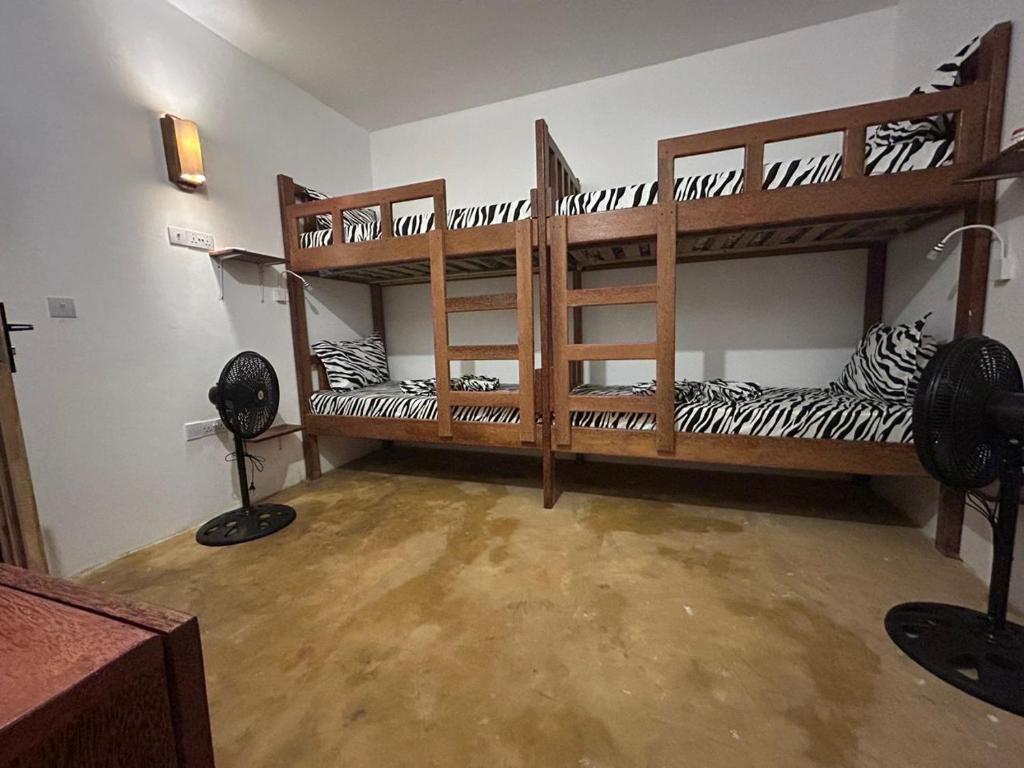 Postel nebo postele na pokoji v ubytování Raphy Home