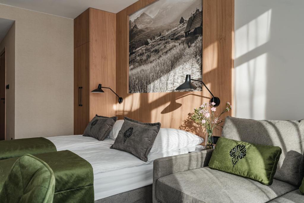 Postel nebo postele na pokoji v ubytování Rewita Zakopane