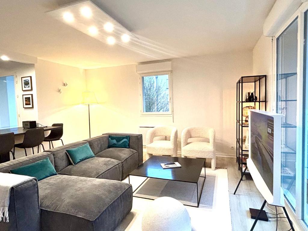 Гостиная зона в LUMIERE- Appartement Design et Élégant