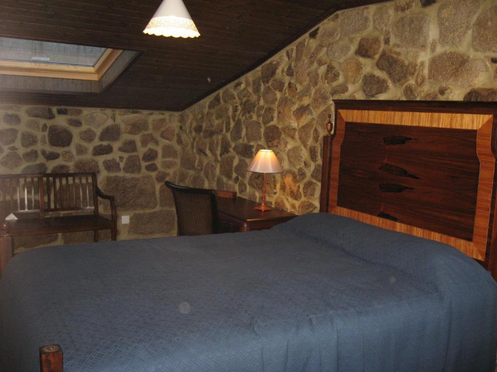 Postel nebo postele na pokoji v ubytování Casa do Castelo de Celorico