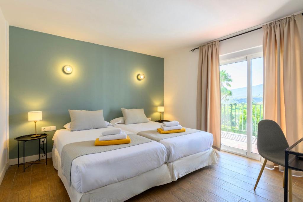 Postel nebo postele na pokoji v ubytování Bandama Golf Hotel by airnest