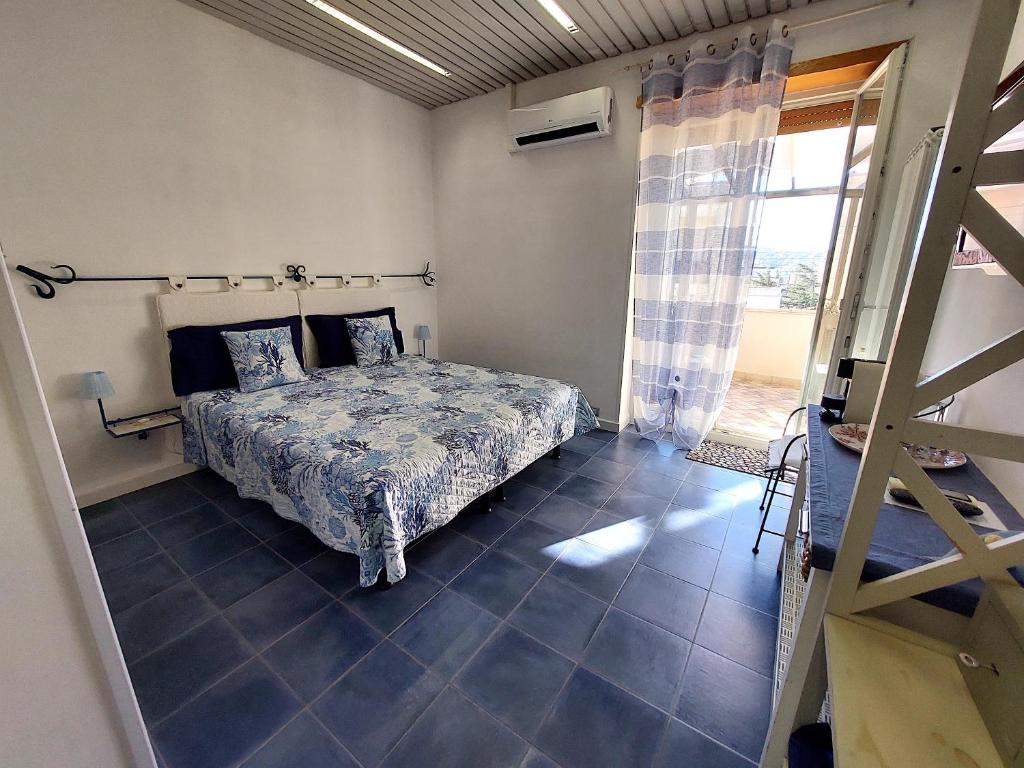 Postel nebo postele na pokoji v ubytování Nughe 'e' Oro Guesthouse