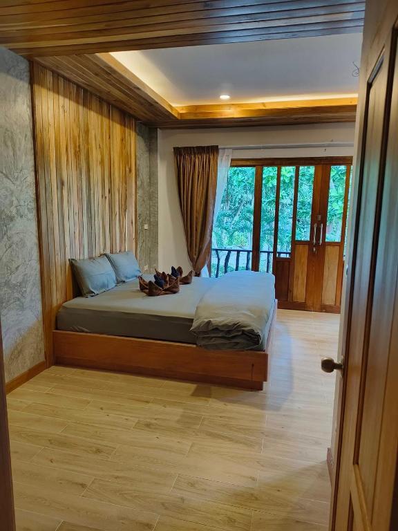 Postel nebo postele na pokoji v ubytování Dewshore Resort