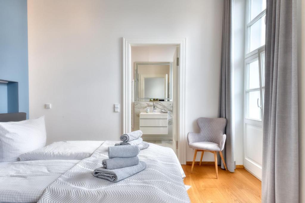 Postel nebo postele na pokoji v ubytování Ferienwohnung Kleine Auszeit in Putbus
