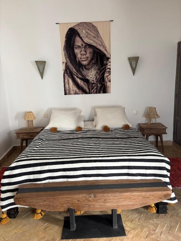 Postel nebo postele na pokoji v ubytování Riad Dar Dayana