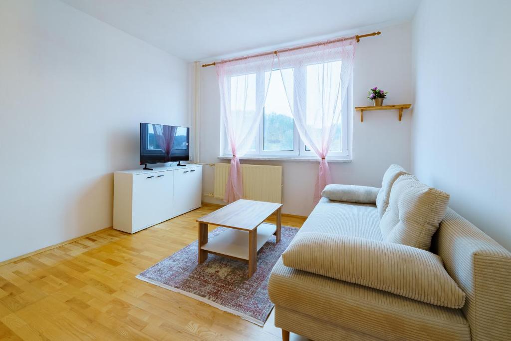 TV a/nebo společenská místnost v ubytování EVerLuck město