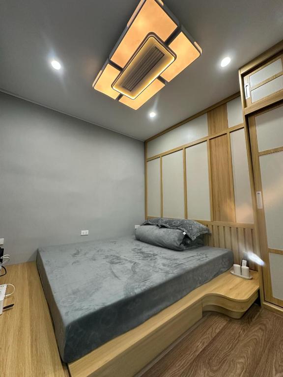 Postel nebo postele na pokoji v ubytování HaNoi HomeStay 43