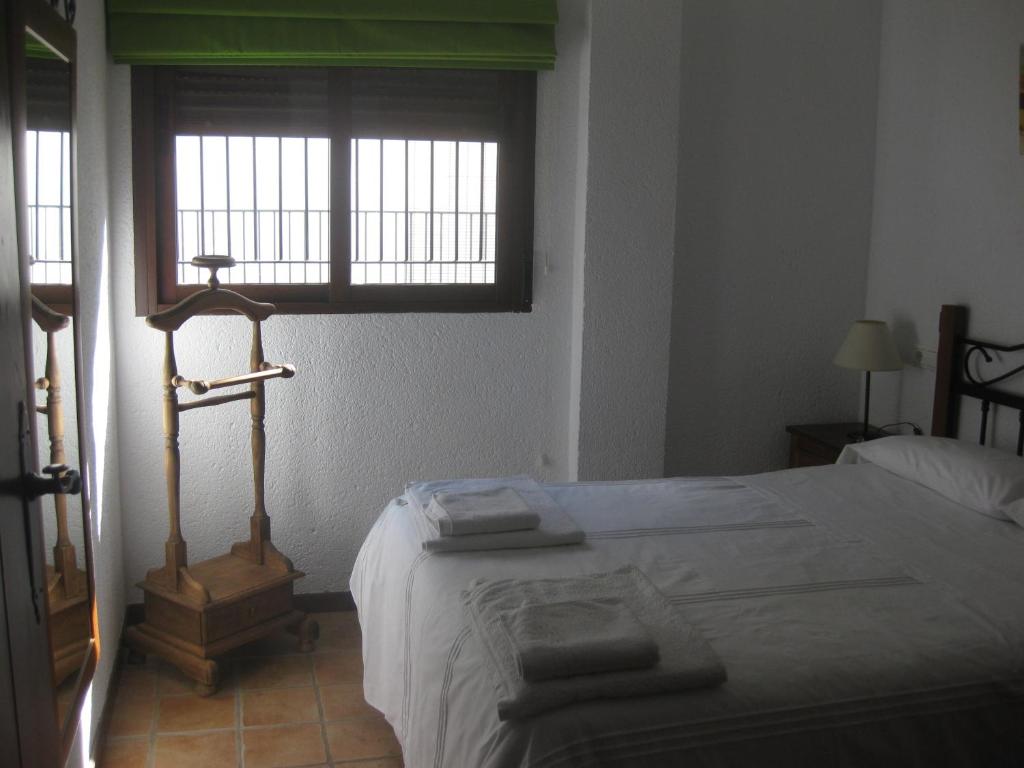 Postel nebo postele na pokoji v ubytování Casa Viola De Cazorla