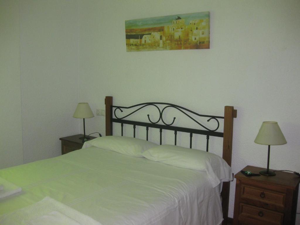Postel nebo postele na pokoji v ubytování Casa Viola De Cazorla
