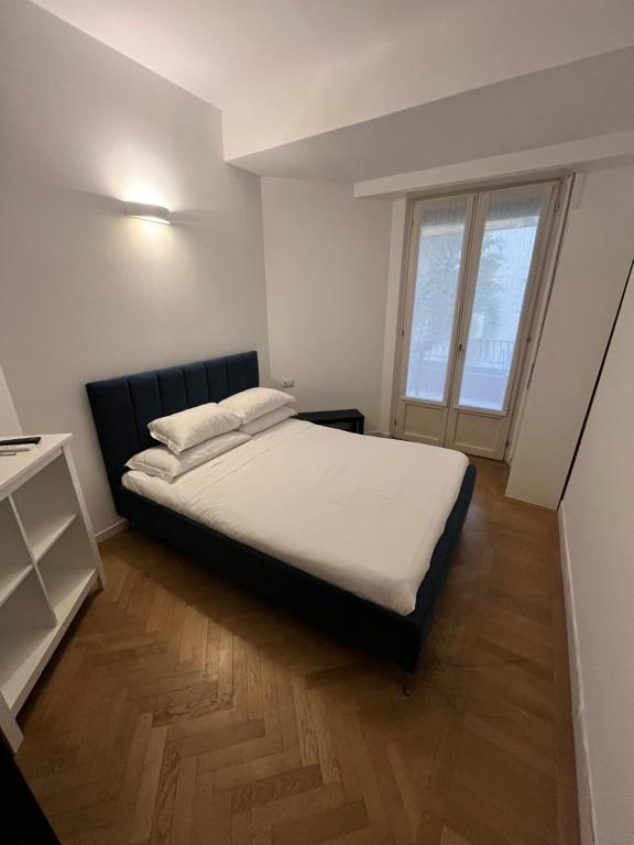 Postel nebo postele na pokoji v ubytování Room Verona Ai Duchi