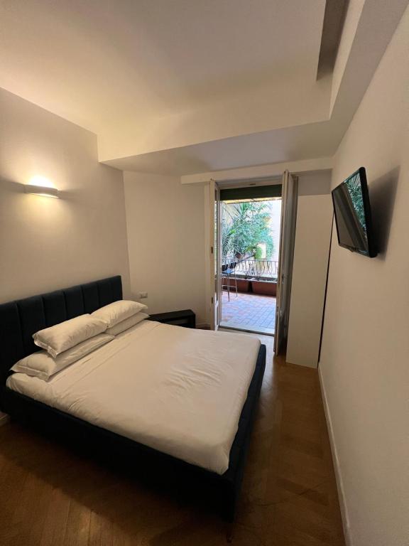 Postel nebo postele na pokoji v ubytování Room Verona Ai Duchi