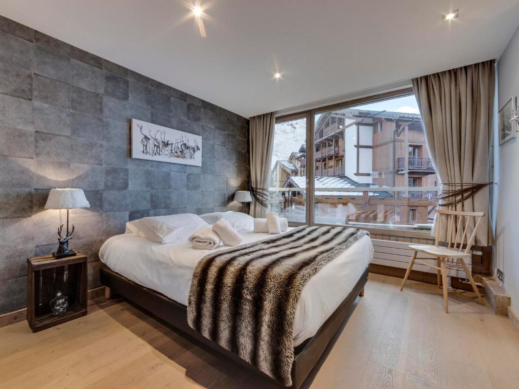 Posteľ alebo postele v izbe v ubytovaní Appartement spacieux, 4 chambres, 8 personnes, WiFi, Tignes le Lac - FR-1-641-15