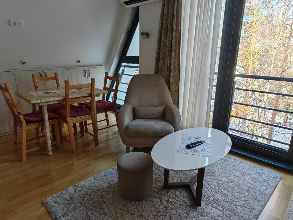 Un lugar para sentarse en Apartman Monika Wind Resort