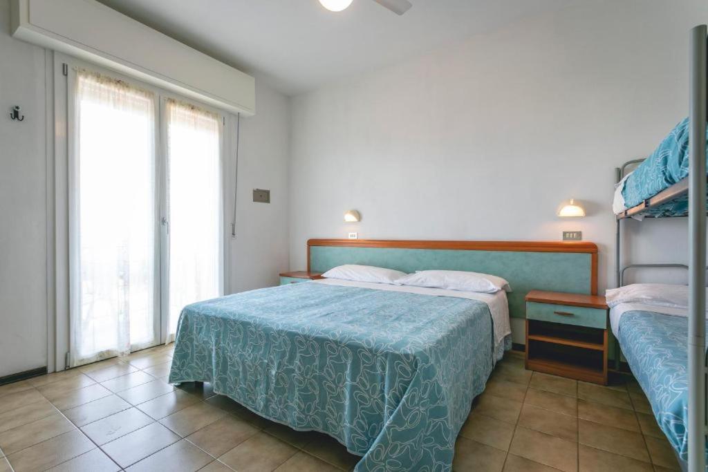 Postel nebo postele na pokoji v ubytování Hotel del Falco