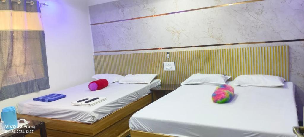Postel nebo postele na pokoji v ubytování MERCY INN