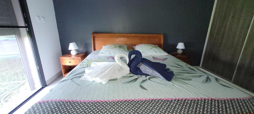 Postel nebo postele na pokoji v ubytování Chambre privée dans maison