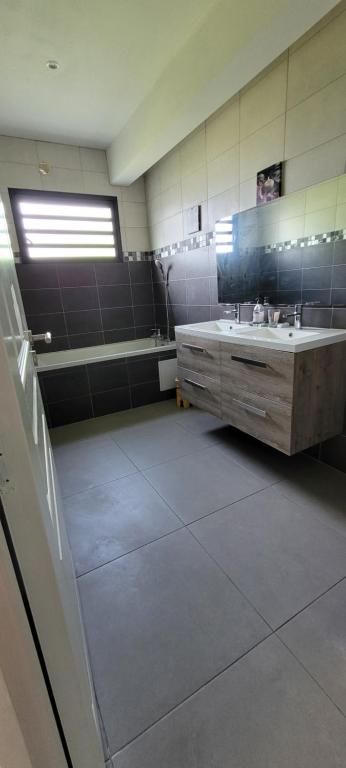Postel nebo postele na pokoji v ubytování Chambre privée dans maison