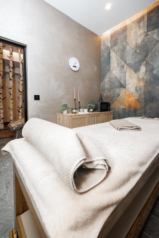 Postel nebo postele na pokoji v ubytování Hotel Sedlo - Golija