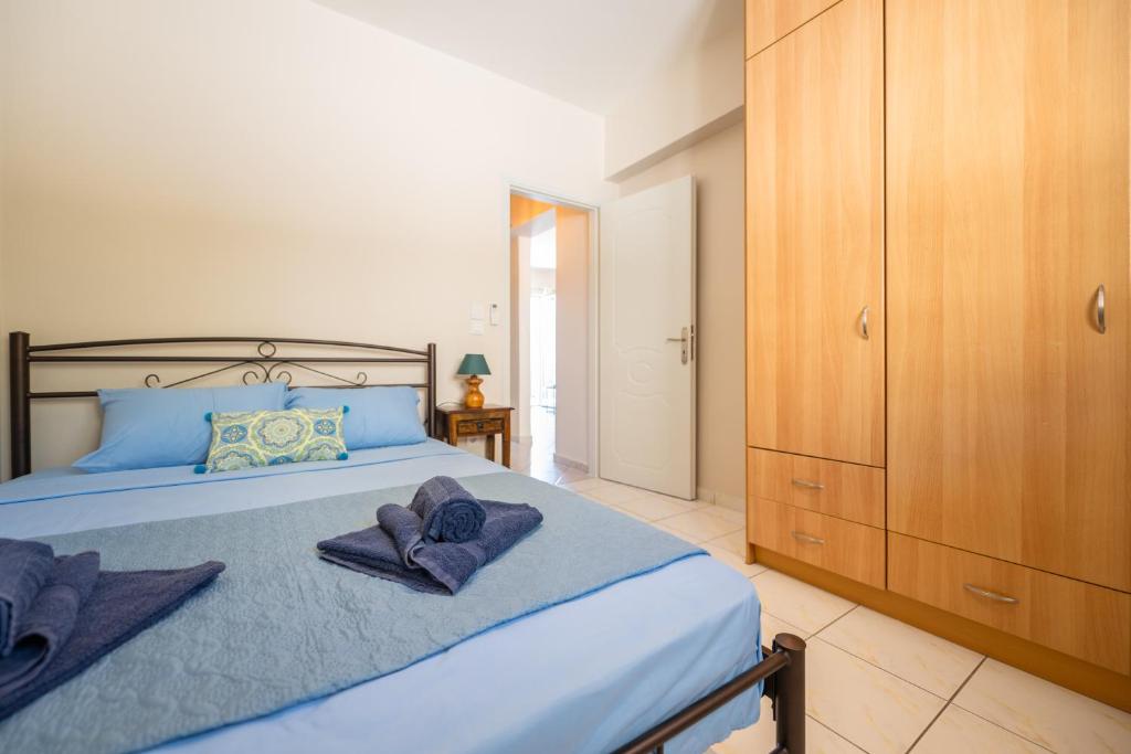 Posteľ alebo postele v izbe v ubytovaní Apaggio di Argostoli Apartments - private parking & sea view