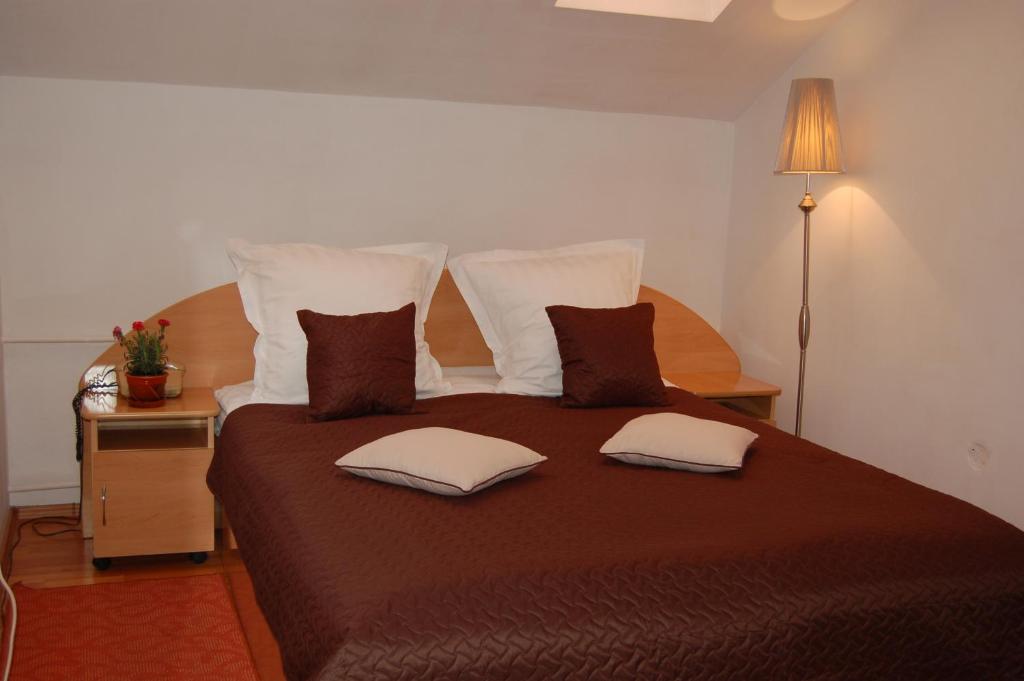 Postel nebo postele na pokoji v ubytování Motel Maestro