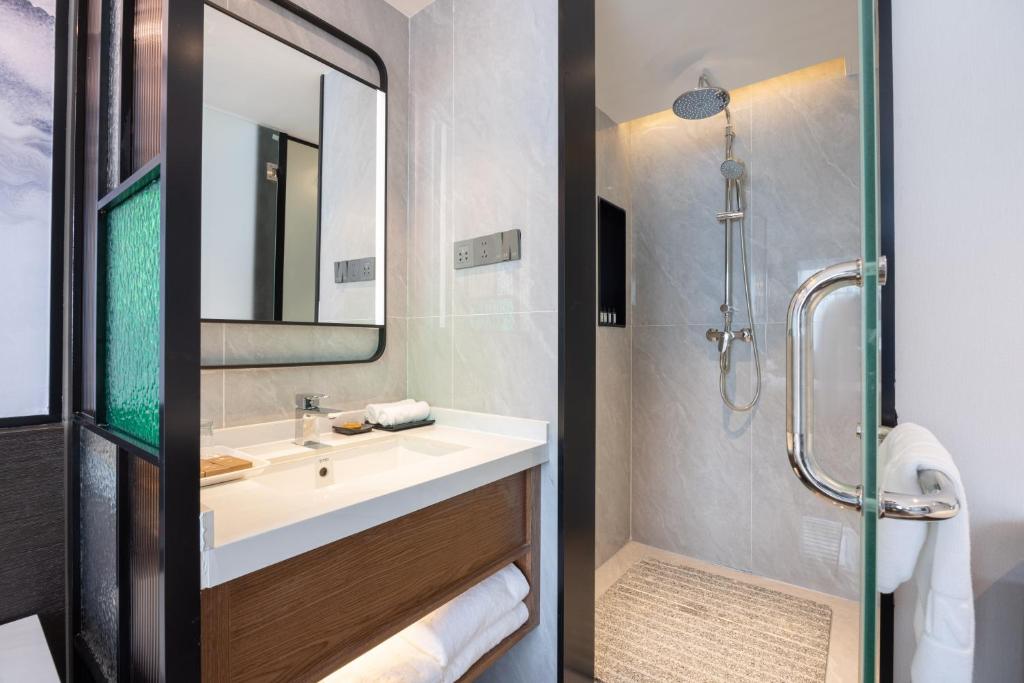 Koupelna v ubytování Sanyu Hotel