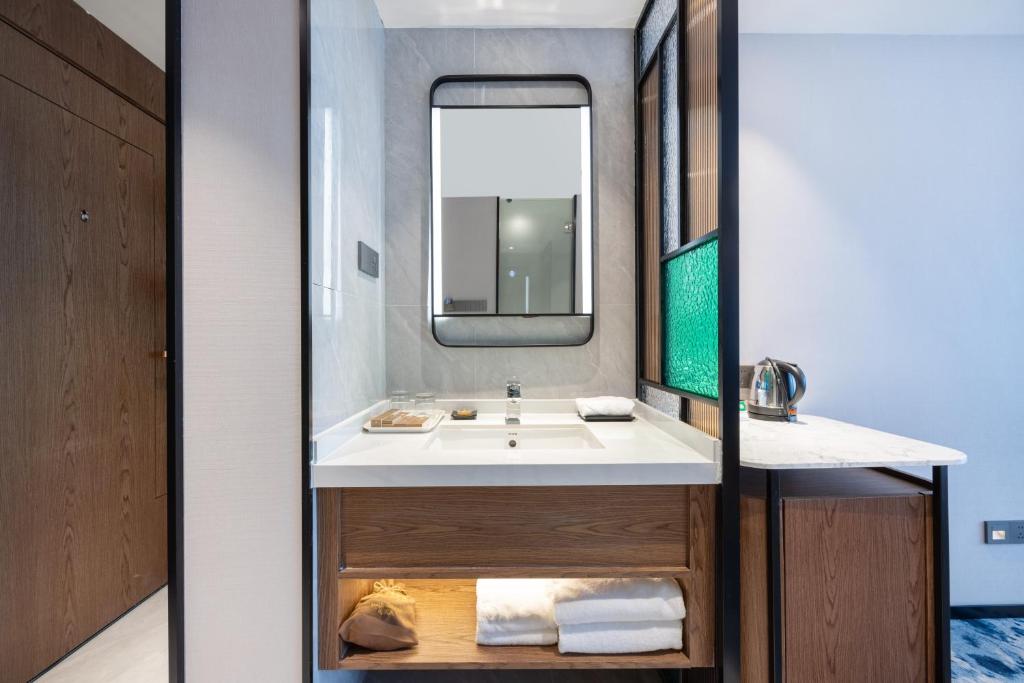 Koupelna v ubytování Sanyu Hotel