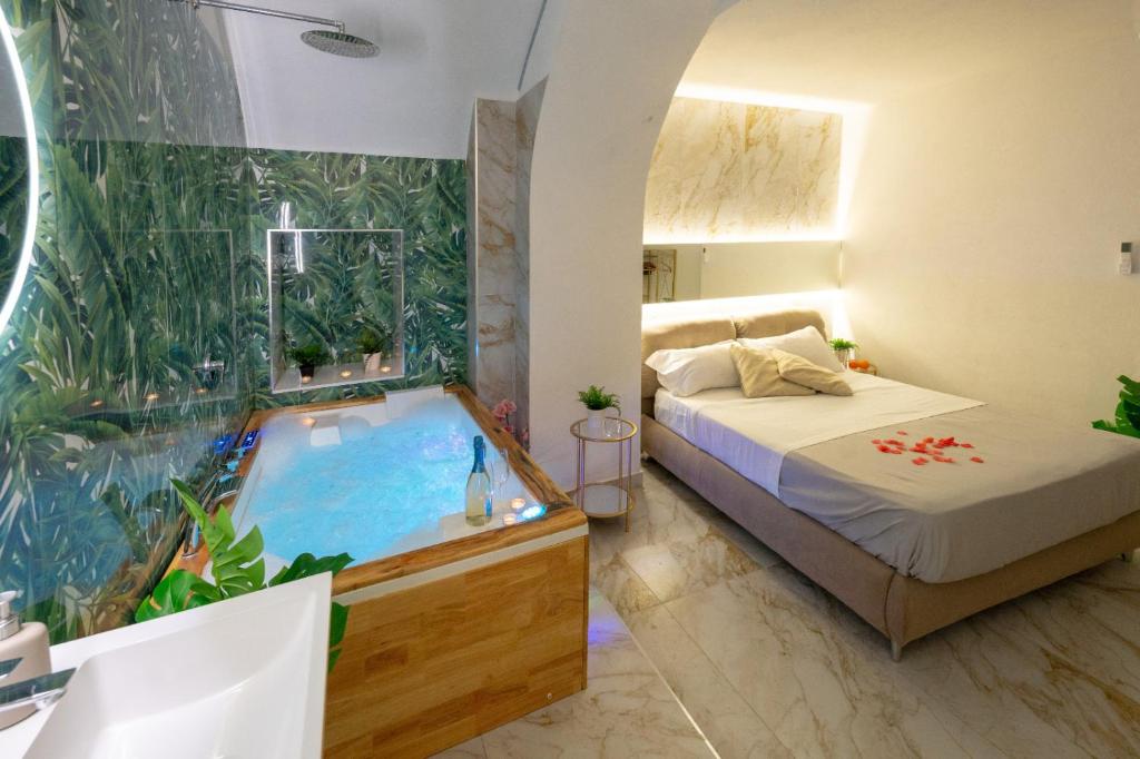 Voodi või voodid majutusasutuse ETNEA 208 LUXURY JACUZZI SUITE Catania toas