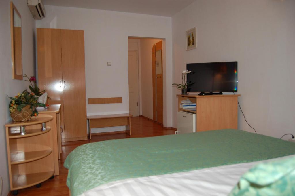 TV a/nebo společenská místnost v ubytování Motel Maestro