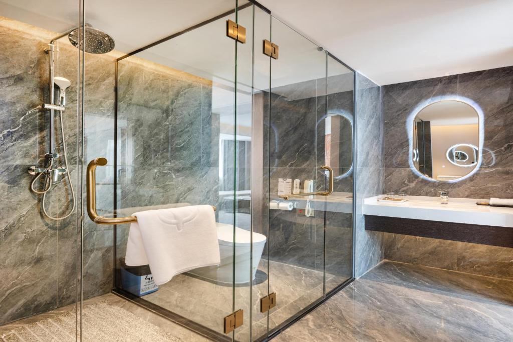 Koupelna v ubytování Sanyu Hotel