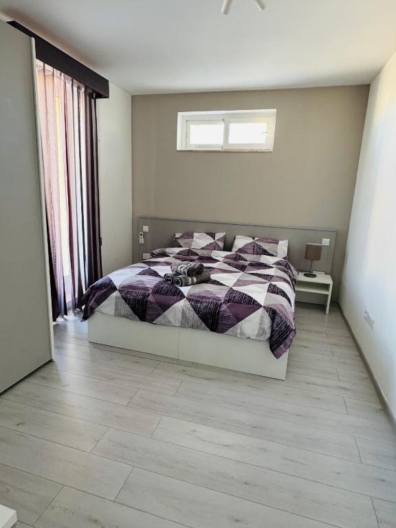 Letto o letti in una camera di Skyline Soak, Views & Jacuzzi