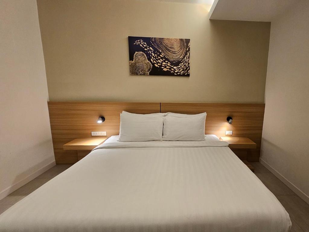 ARENICE Boutique Hotel客房内的一张或多张床位