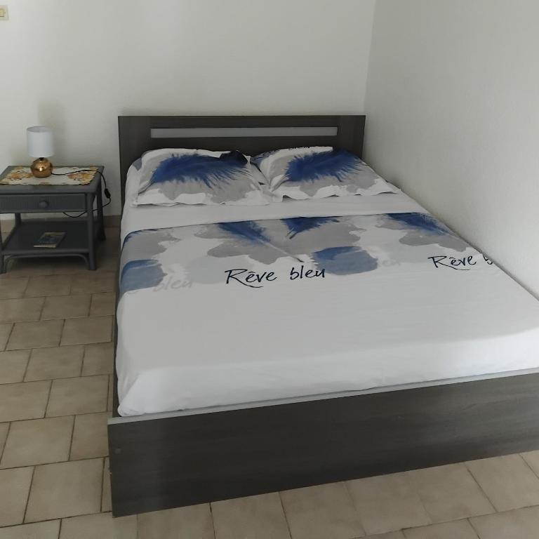 Postel nebo postele na pokoji v ubytování T1 Gardénia