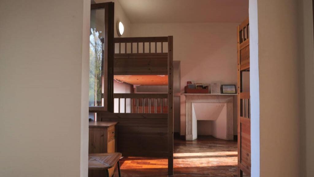 Postel nebo postele na pokoji v ubytování Cascina Govean