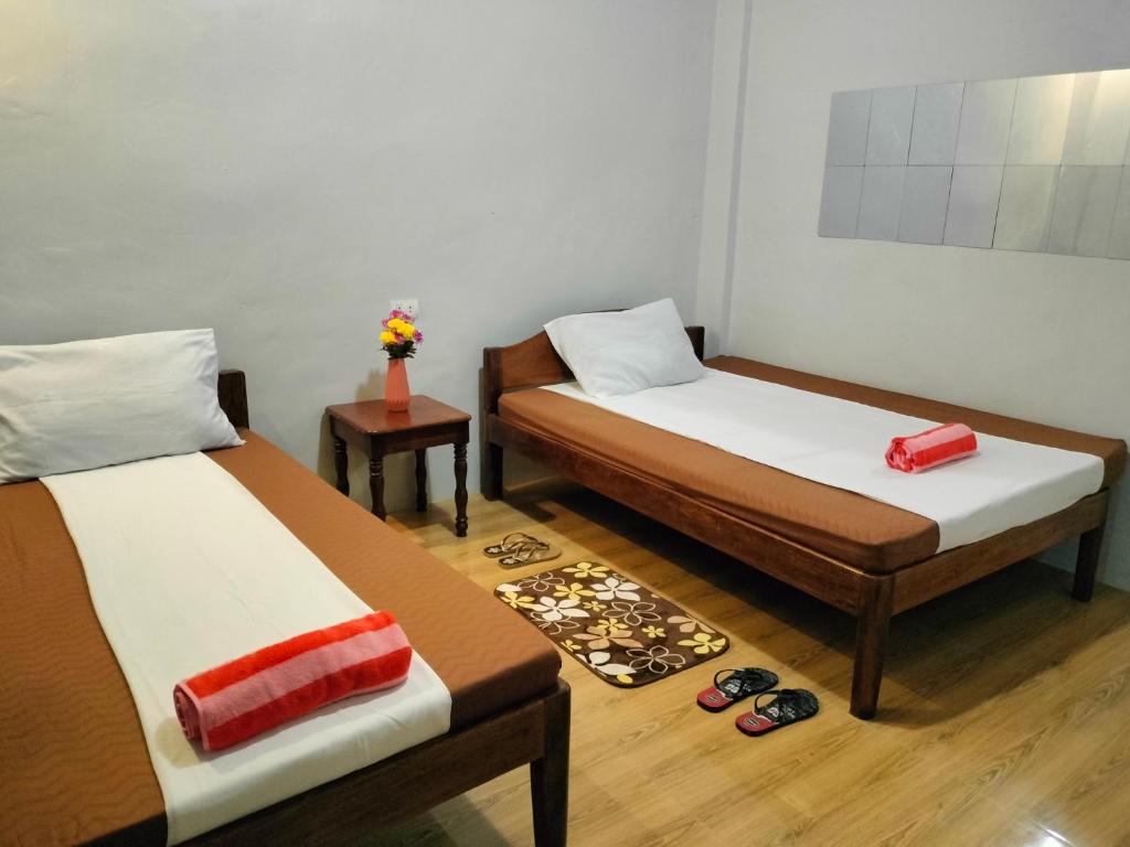 Postel nebo postele na pokoji v ubytování EL3 Z'sPLACE HOSTEL