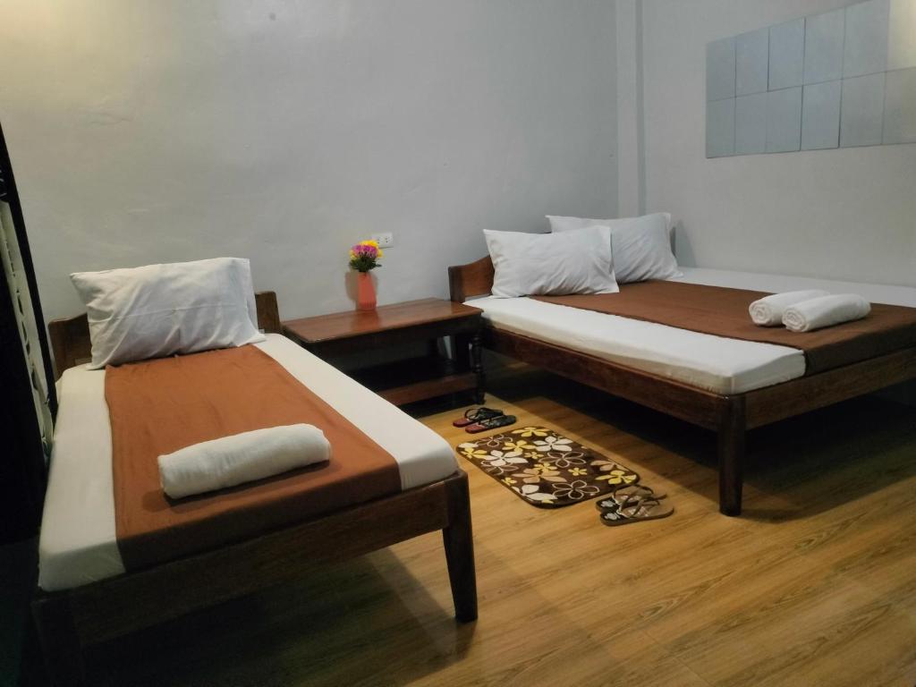 Postel nebo postele na pokoji v ubytování EL3 Z'sPLACE HOSTEL
