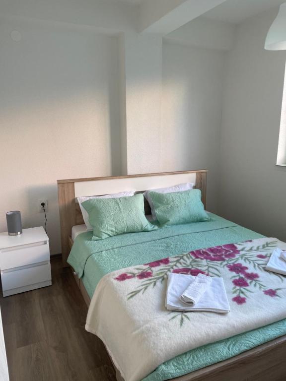 Postel nebo postele na pokoji v ubytování Apartment Gjorgijevski