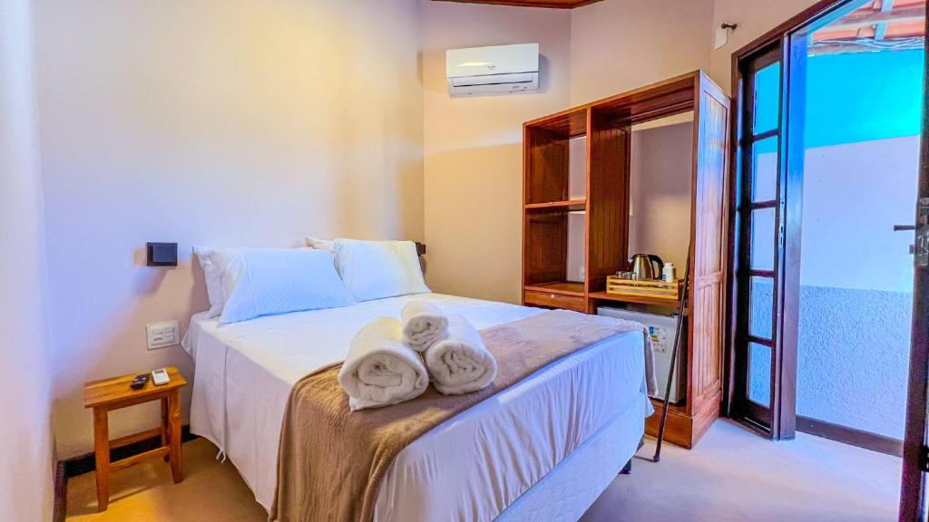 Postel nebo postele na pokoji v ubytování Balanço do Mar Rooms