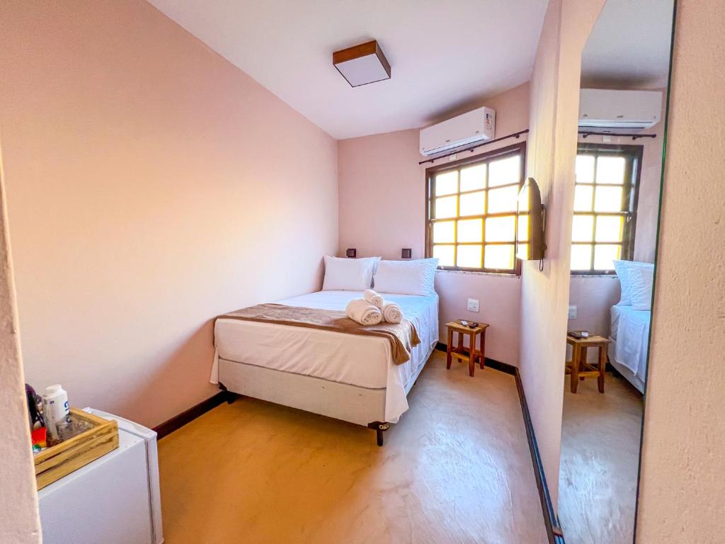 Postel nebo postele na pokoji v ubytování Balanço do Mar Rooms