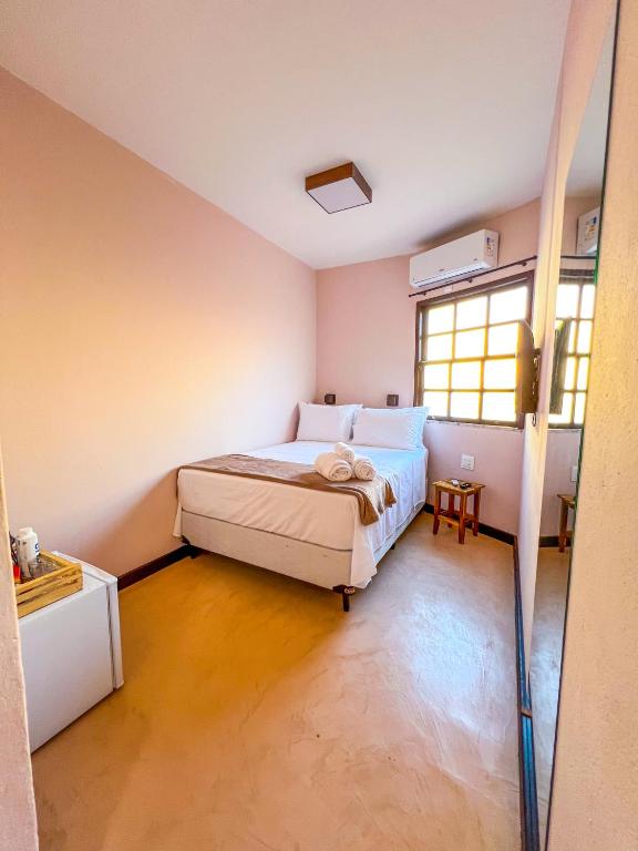Postel nebo postele na pokoji v ubytování Balanço do Mar Rooms