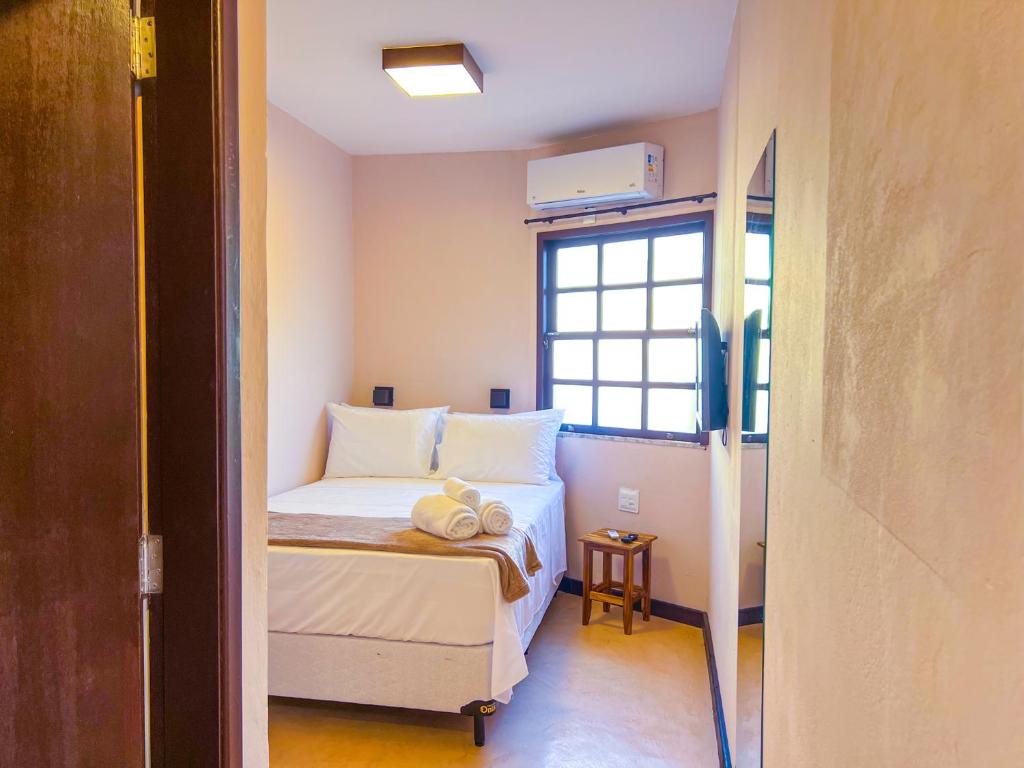 Postel nebo postele na pokoji v ubytování Balanço do Mar Rooms