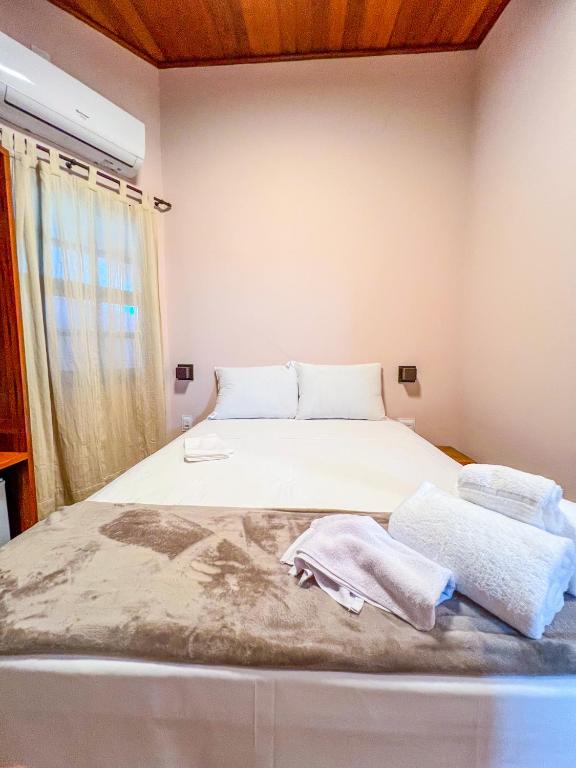 Postel nebo postele na pokoji v ubytování Balanço do Mar Rooms