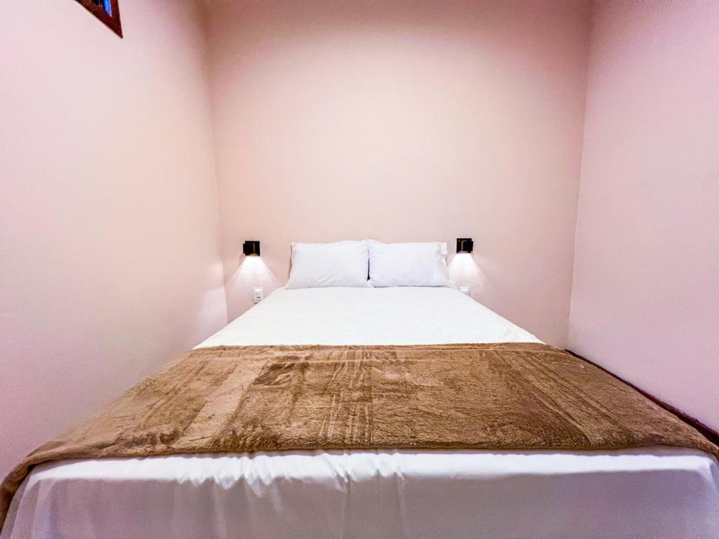 Postel nebo postele na pokoji v ubytování Balanço do Mar Rooms