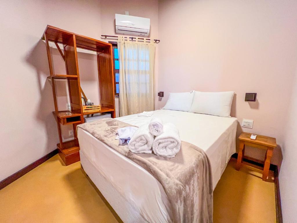 Postel nebo postele na pokoji v ubytování Balanço do Mar Rooms