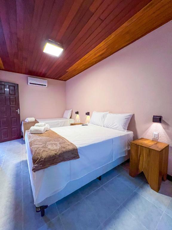 Postel nebo postele na pokoji v ubytování Balanço do Mar Rooms