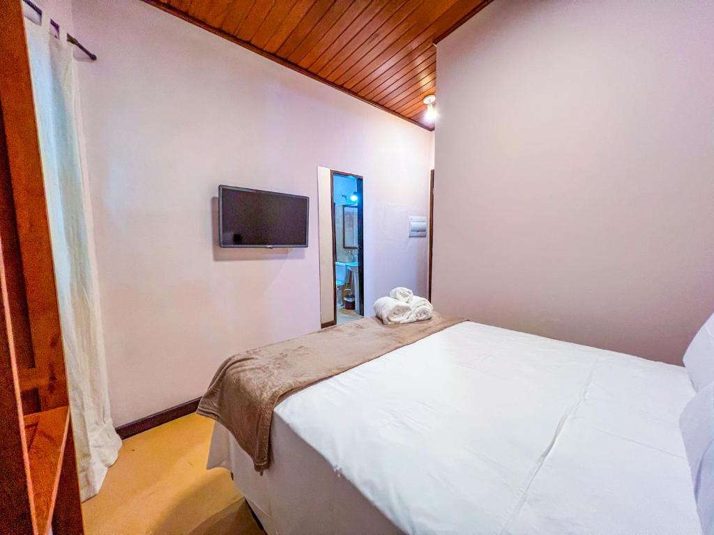 Postel nebo postele na pokoji v ubytování Balanço do Mar Rooms