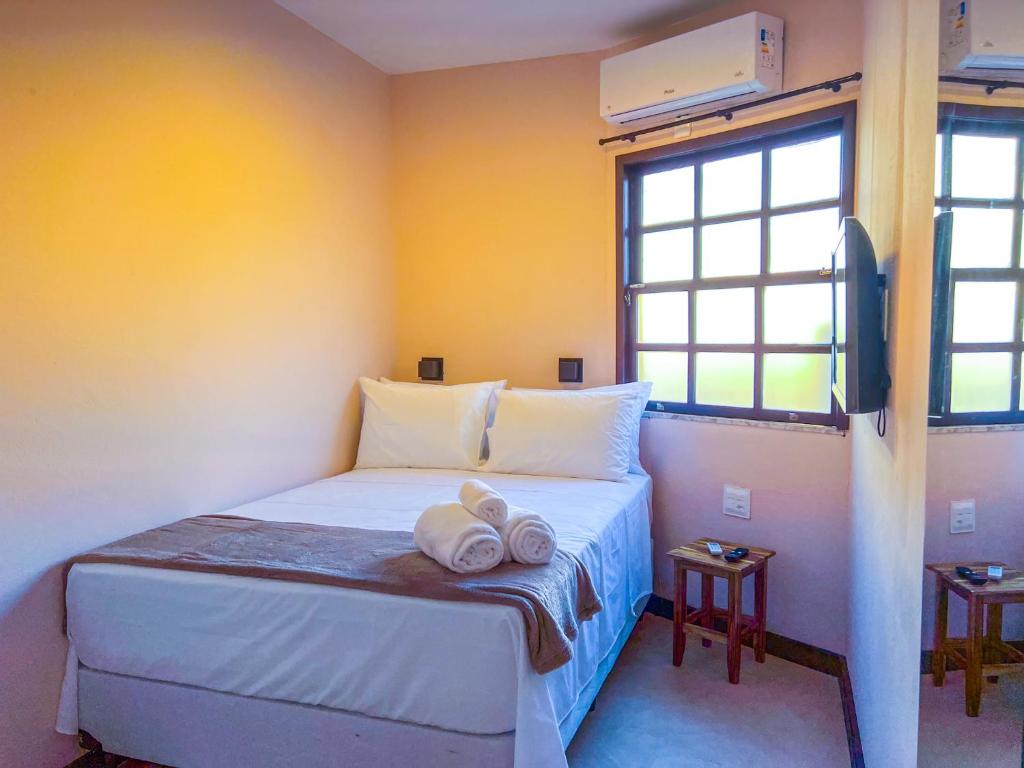 Postel nebo postele na pokoji v ubytování Balanço do Mar Rooms