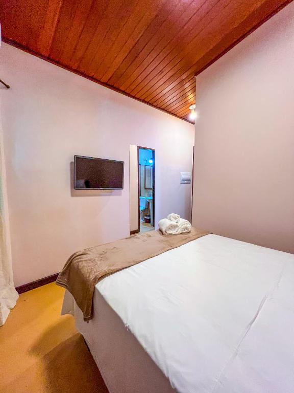 Postel nebo postele na pokoji v ubytování Balanço do Mar Rooms