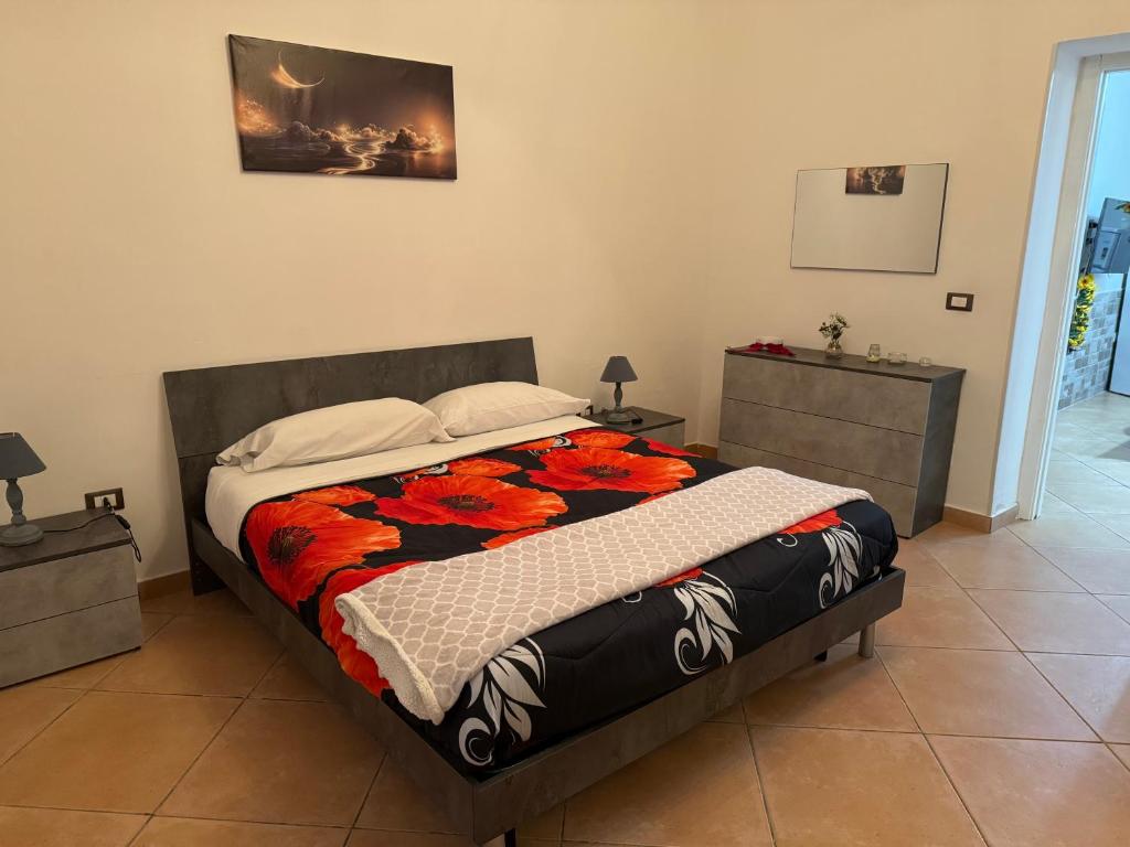 Postel nebo postele na pokoji v ubytování L' Arco Antico